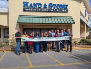 Hand & Stone Ribbon Cutting exterior