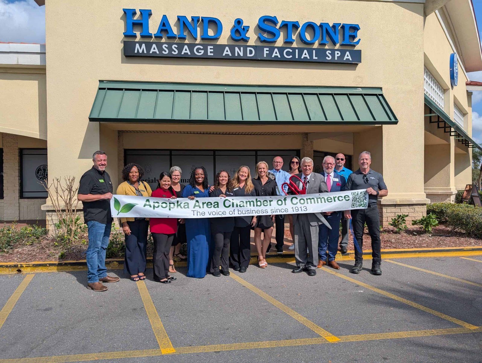 Hand & Stone Ribbon Cutting exterior